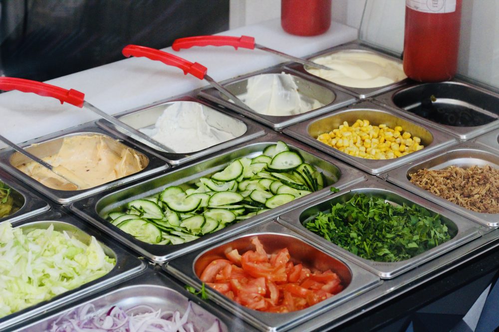Fresh sauces and salad toppings at Ana's Kebab